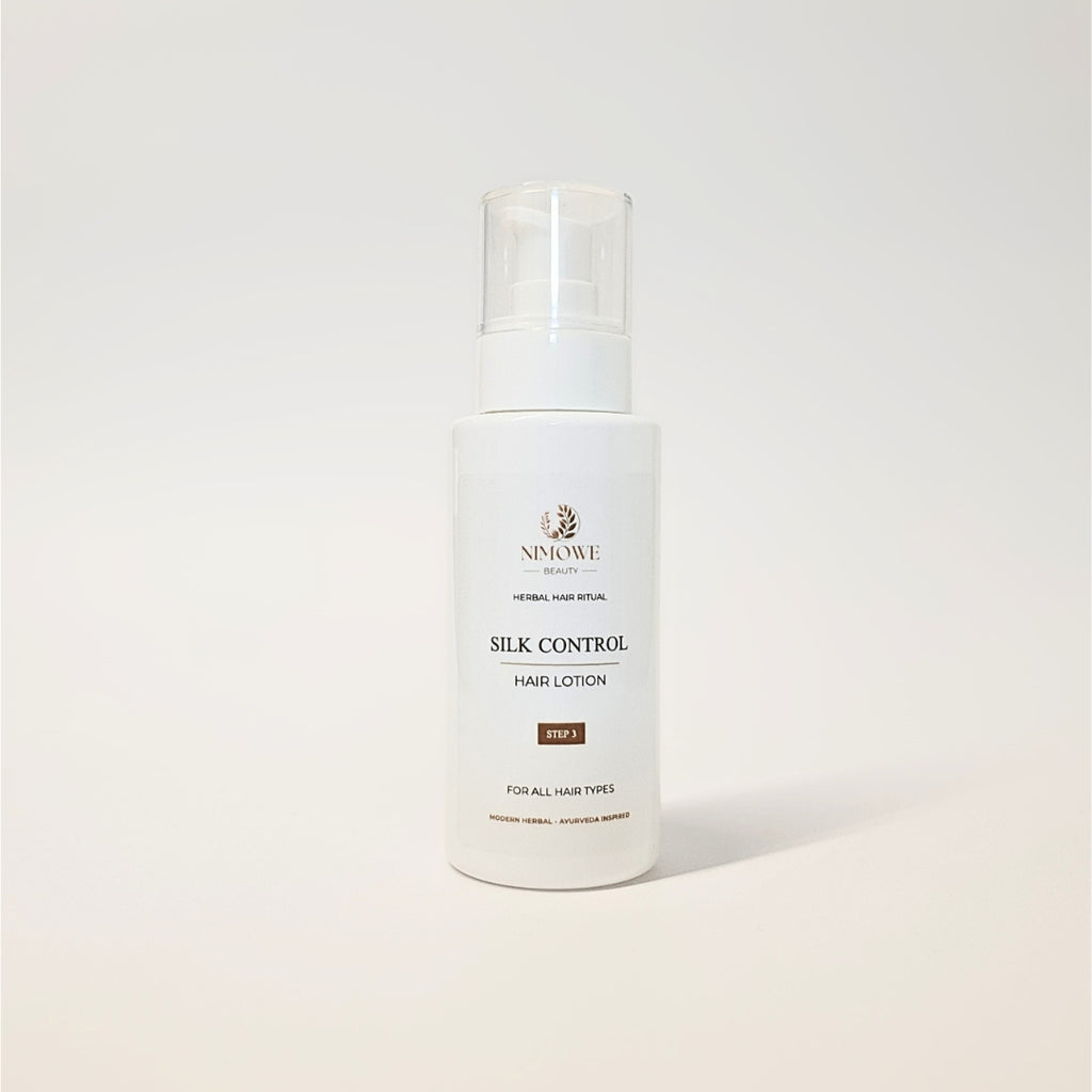 Silk Control Hair Lotion – vit flaska med vit pump och transparent lock